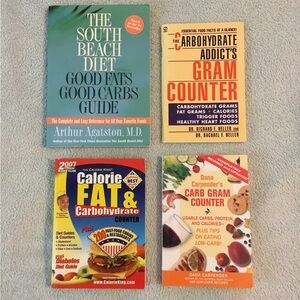 4 CARB COUNTER BOOKS. Very good condition. Clean.